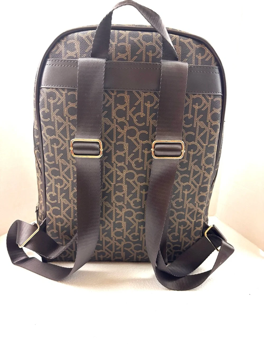 Calvin Klein Elaine Signature Brown Monogram Key Item Flap Large Backpack